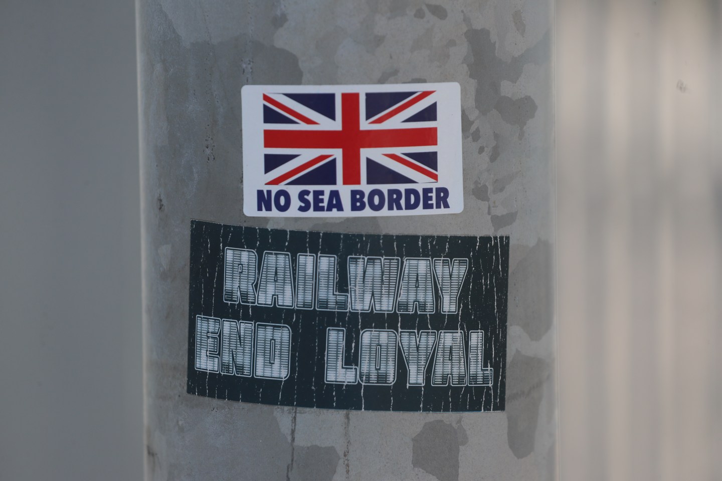 A protest sticker on a lamp post close to the Department of Agricultural, Environment and Rural Affairs facility near Belfast Harbour. The UK has demanded "significant" changes to Northern Ireland's post-Brexit trading arrangements but has held back from tearing up parts of the deal. Picture date: Wednesday July 21, 2021.