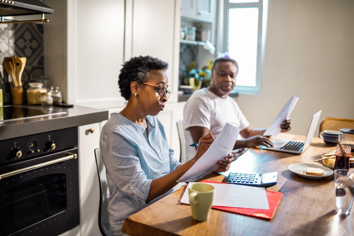 Husband and wife working on retirement savings