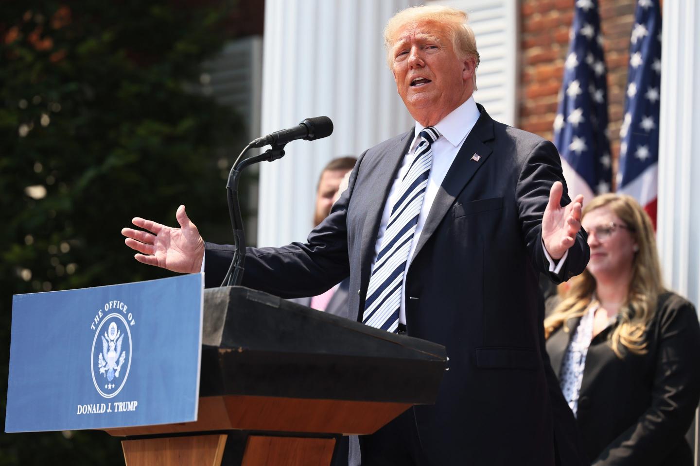 Trump announcing his lawsuit