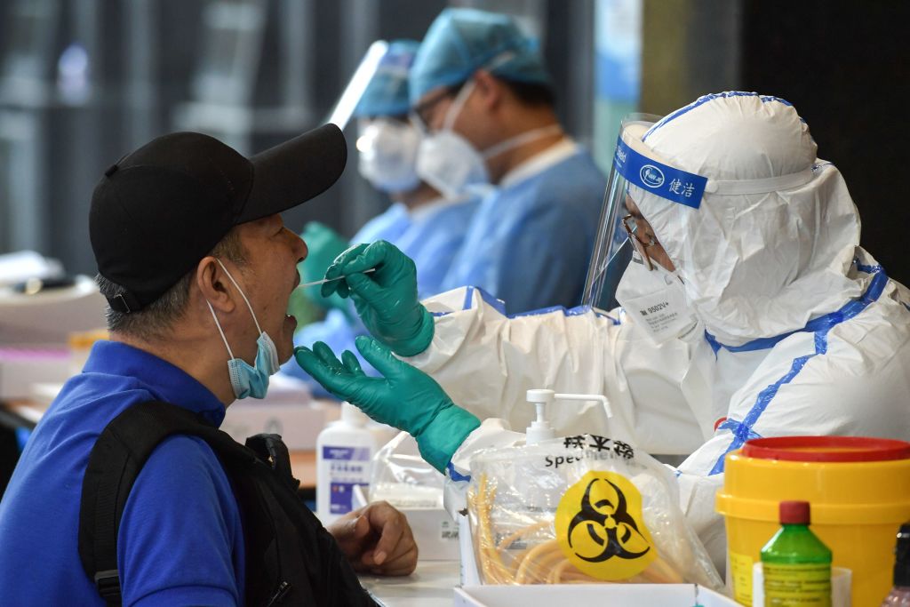 China has slammed cities back into lockdown and mandated universal testing as the country reports its quickest rise in COVID-19 cases since 2020.