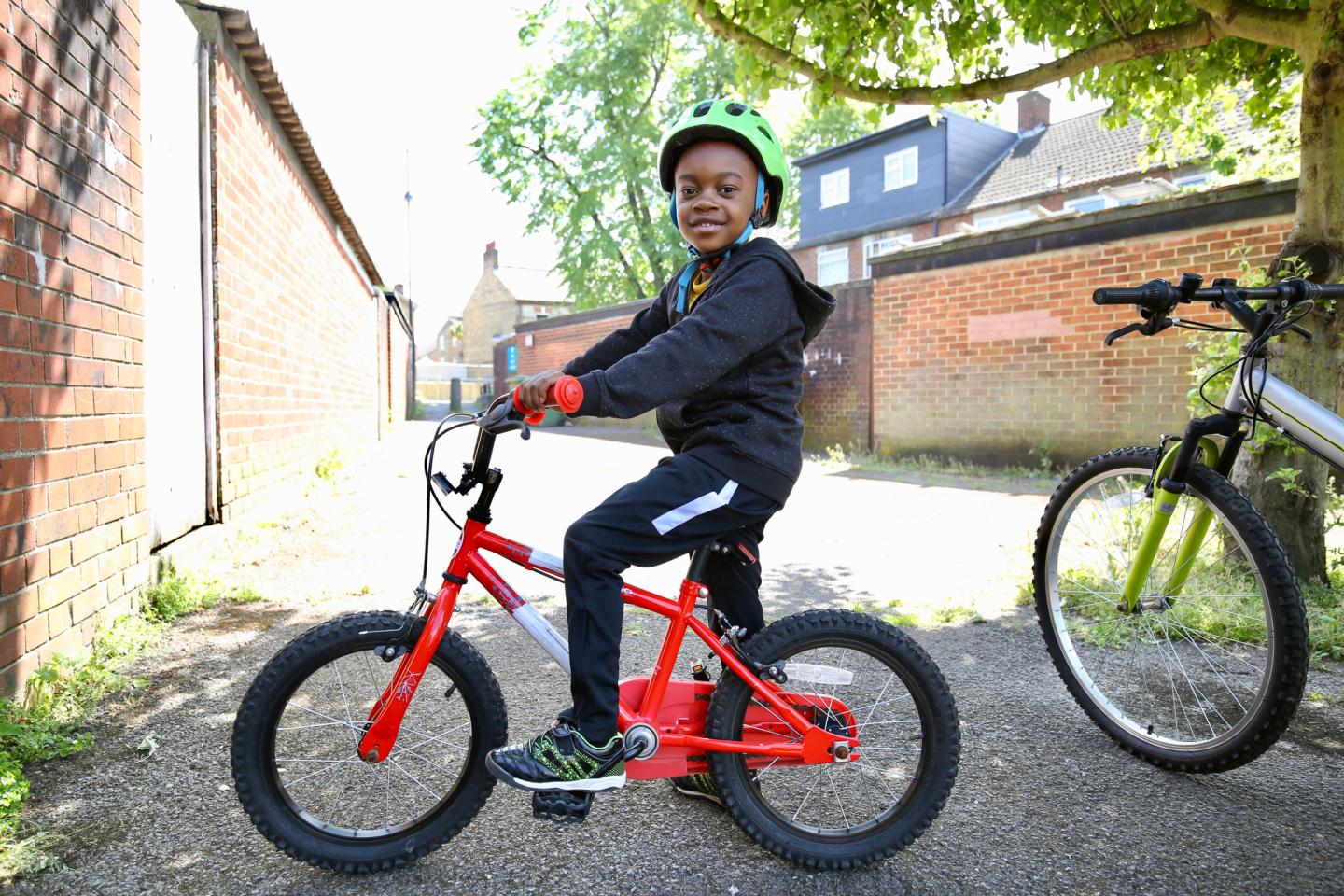 Teaching kids to ride bikes is about more than recreation and health