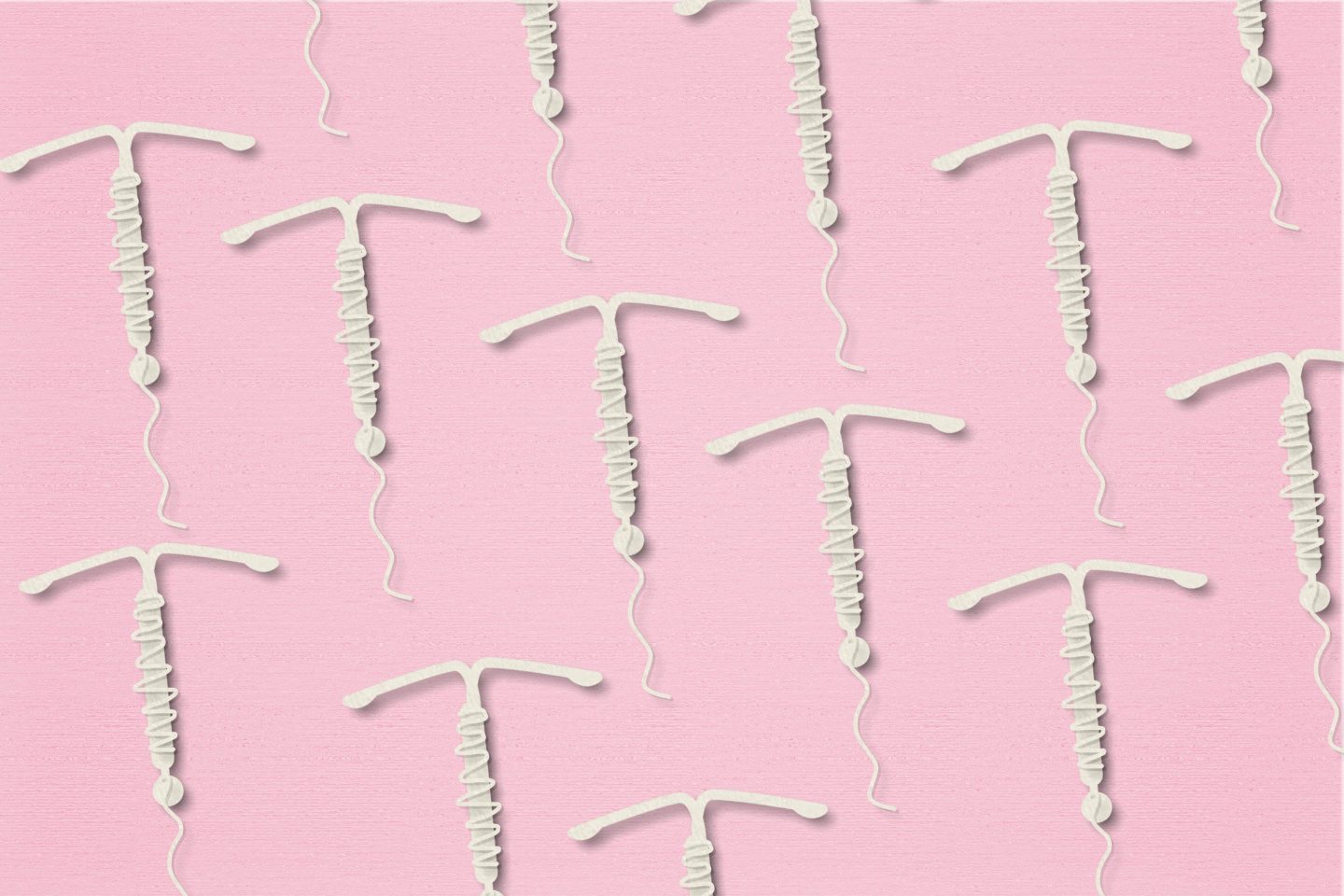 IUD.Concept hormonal contraception on a pink background