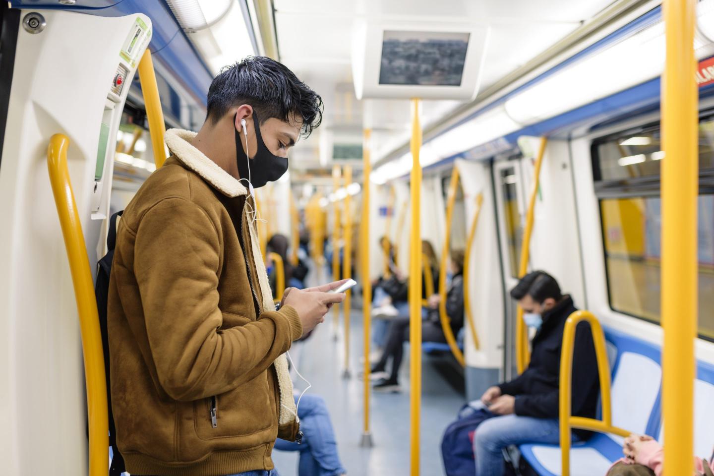 Man commuting on a train