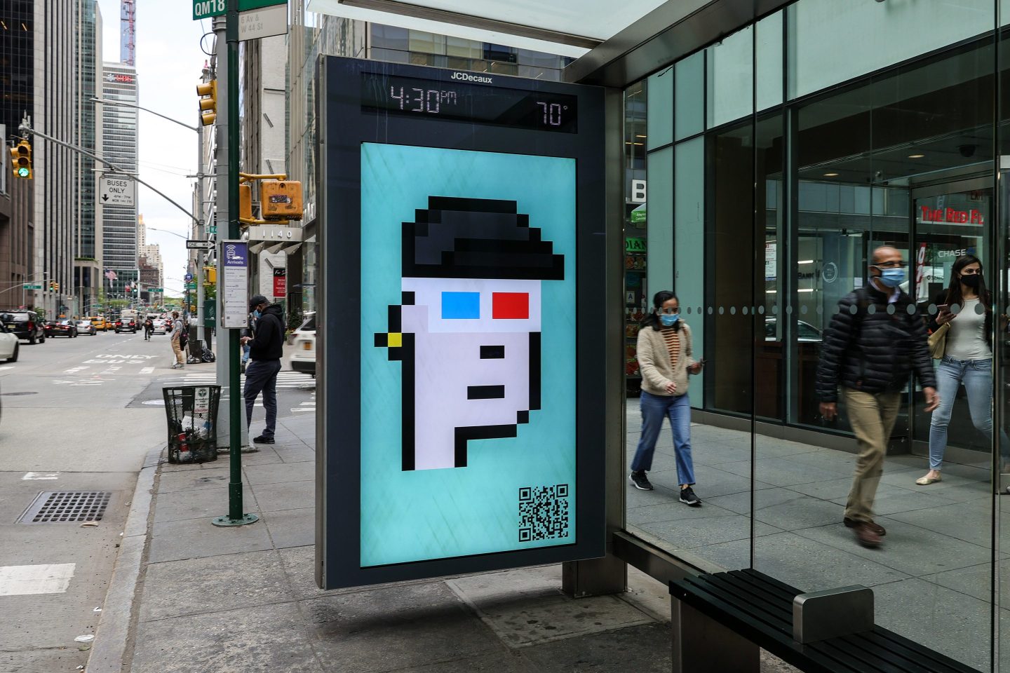 CryptoPunks art on bus stop