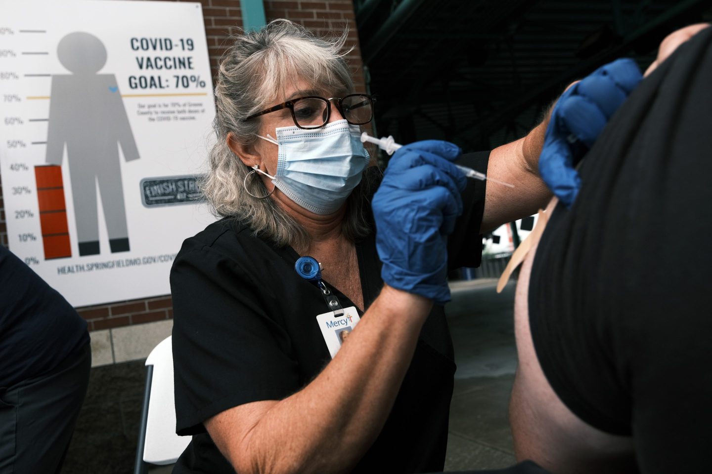 Nurse administers Covid-19 vaccine