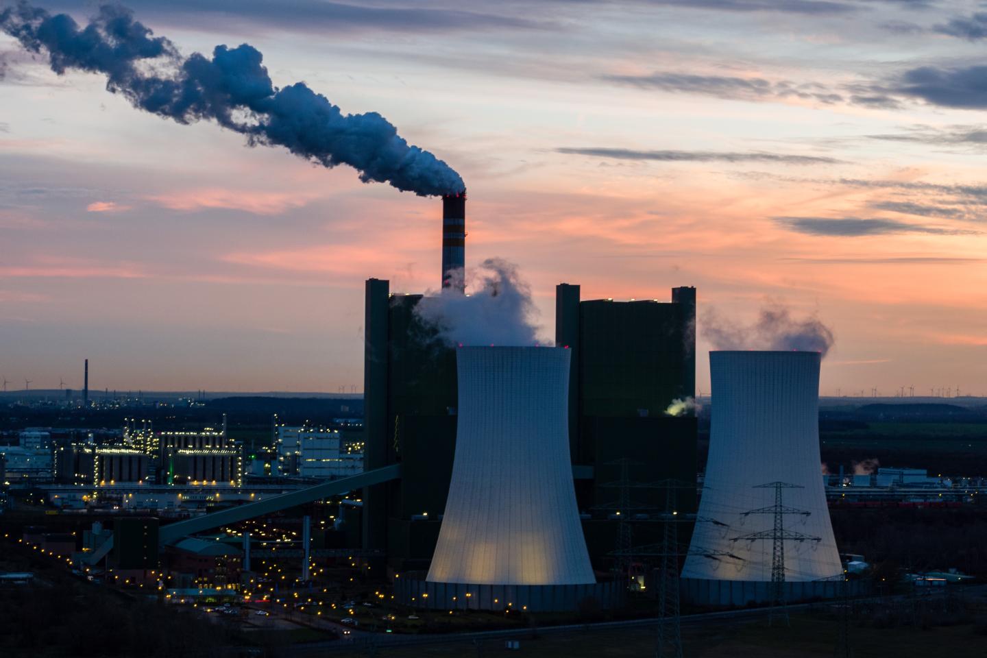 Exhaust gases rise from the chimney of the lignite power plant Uniper power plant Schkopau on December 17, 2019 near Halle, Germany.