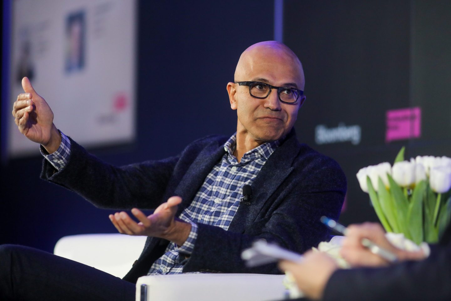 Satya Nadella, chief executive officer of Microsoft Corp., gestures as he speaks during a Bloomberg event on the opening day of the World Economic Forum (WEF) in Davos, Switzerland, on Tuesday, Jan. 21, 2020. World leaders, influential executives, bankers and policy makers attend the 50th annual meeting of the World Economic Forum in Davos from Jan. 21 &#8211; 24. Photographer: Simon Dawson/Bloomberg via Getty Images