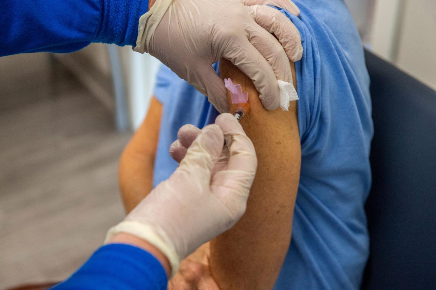 Getting a COVID-19 vaccine booster leads to ‘mostly mild’ side effects, according to the CDC
