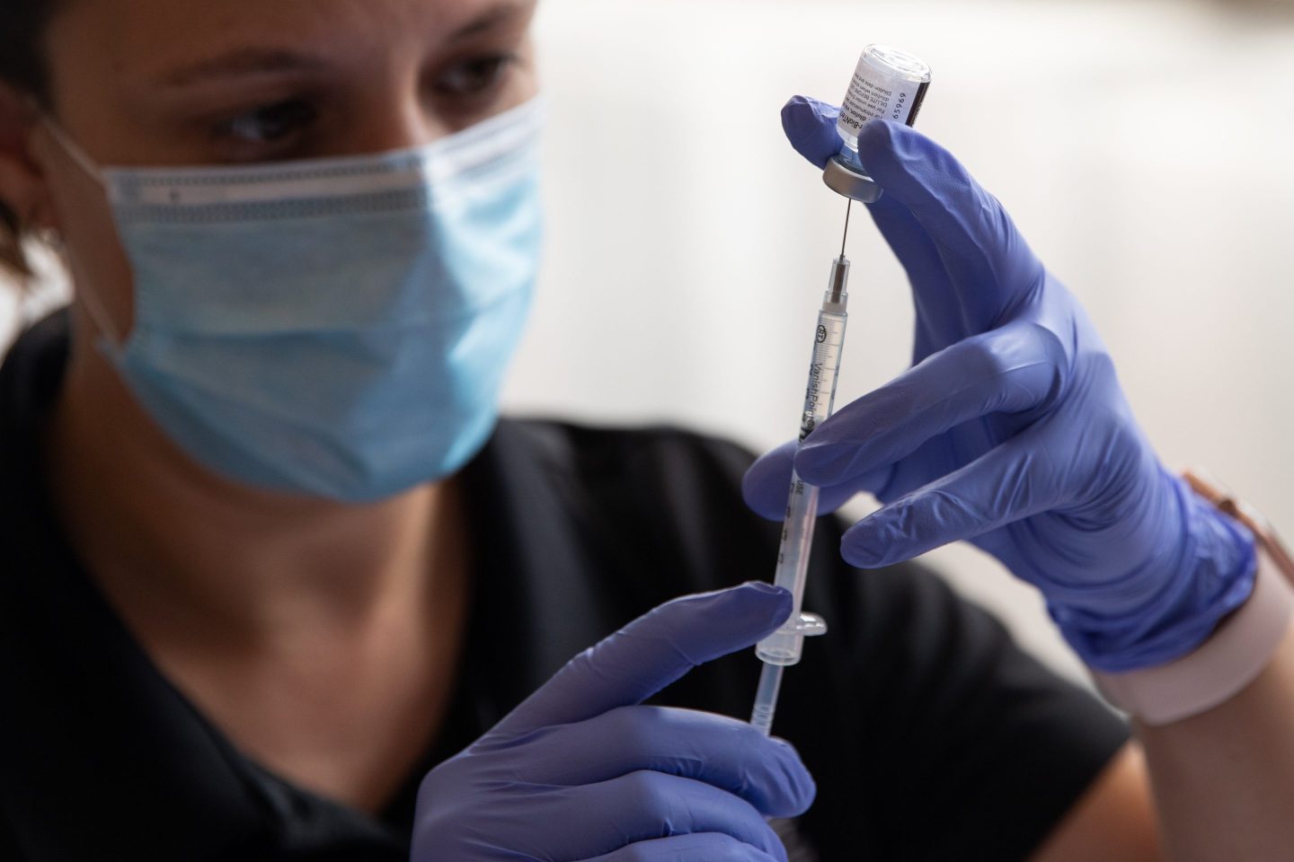 Medical professional with Covid-19 vaccine