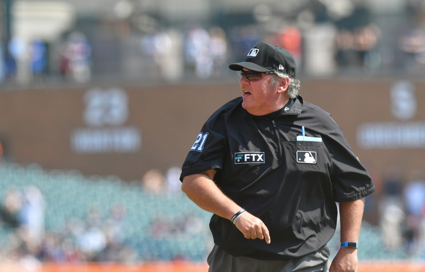 MLB umpire wearing shirt with FTX logo