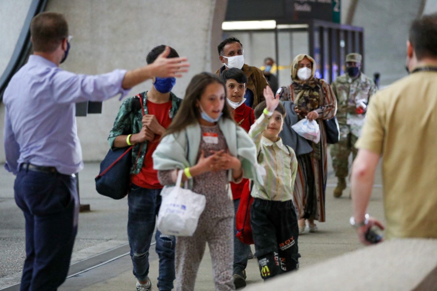 Evacuated Afghans arrive in Washington Dulles International Airport.
