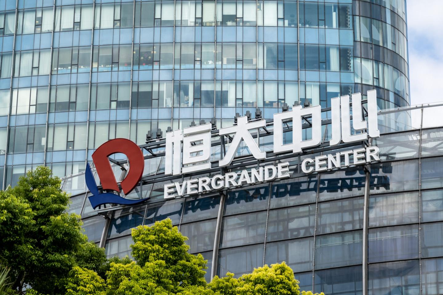 Evergrande, China’s deeply-indebted property developer, defaults on its dollar debt for the first time