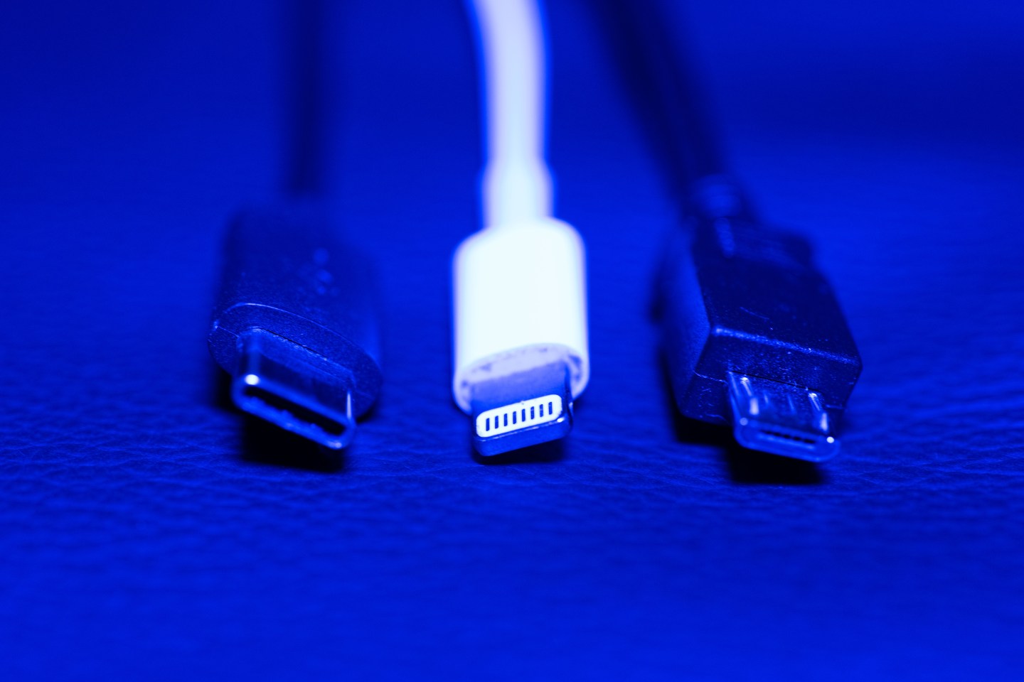 22 September 2021, Lower Saxony, Oldenburg: A USB-C (l-r), an Apple Lightning and a Micro-USB cable (l-r) can be seen next to each other.