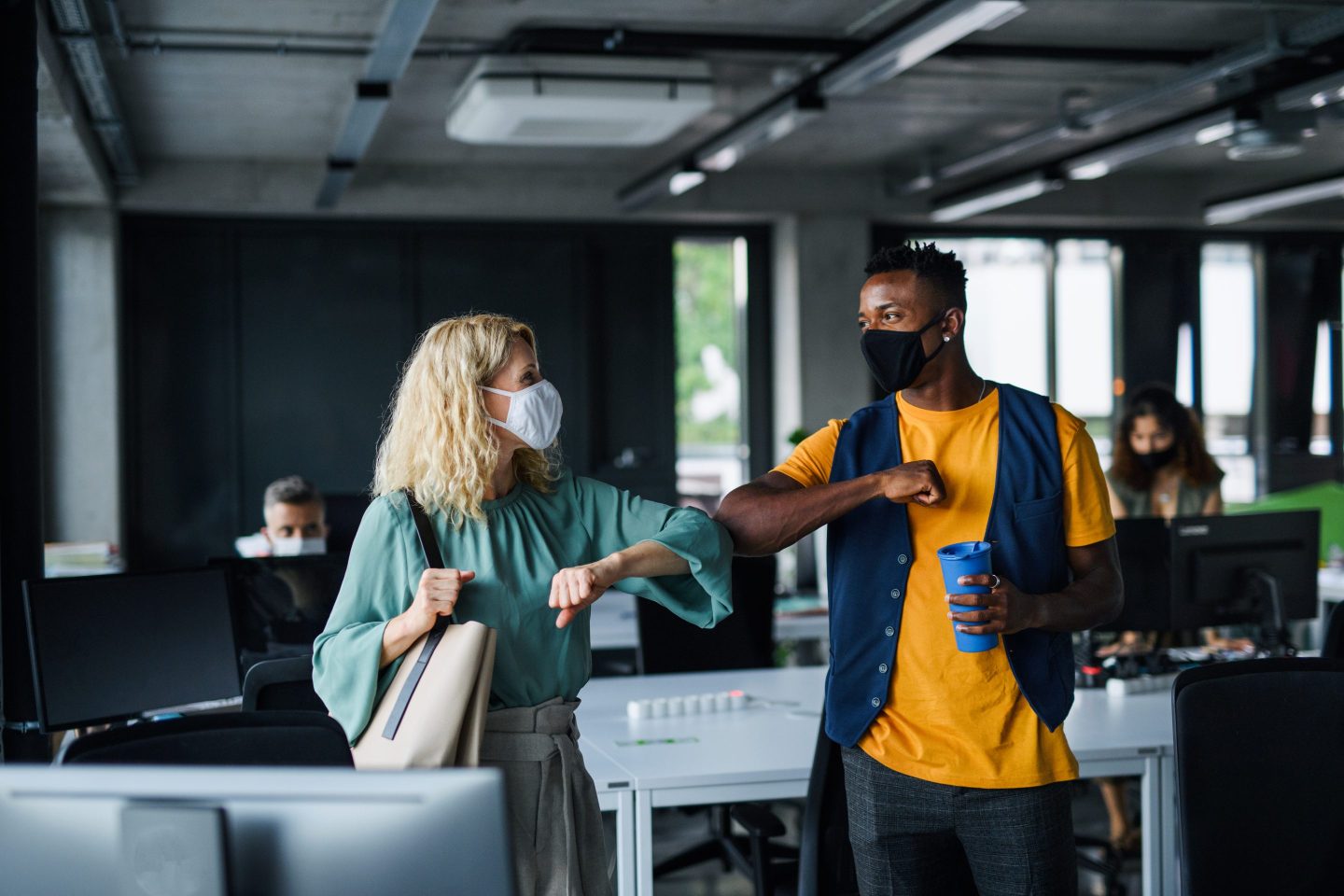 Masked office workers