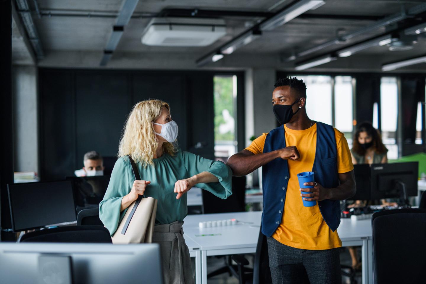 Masked office workers