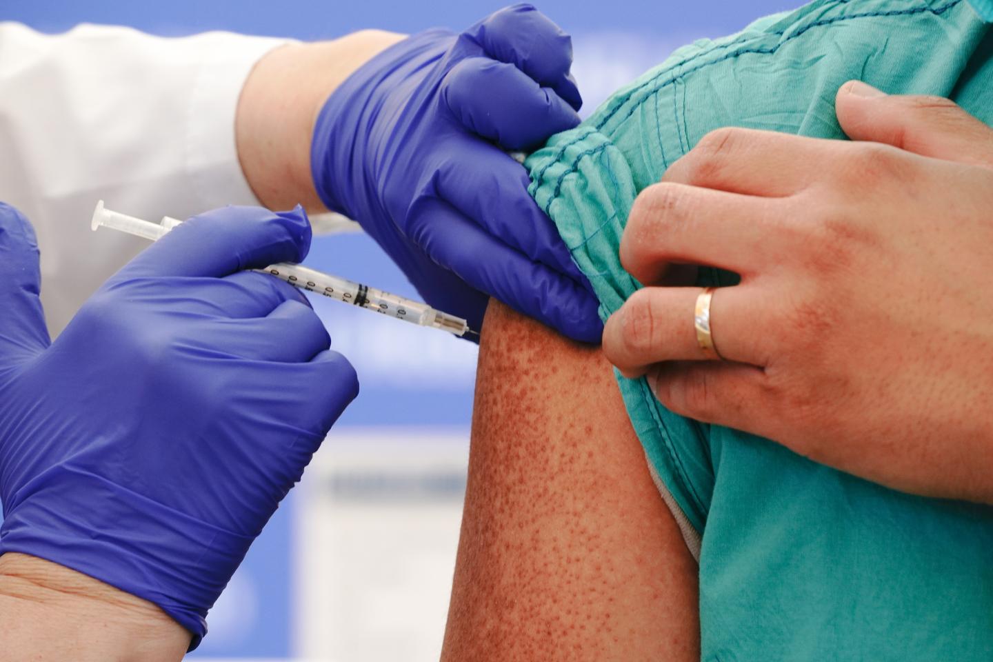 Days after the FDA rejected COVID booster shots for people 16 and up, a CDC panel will decide who gets an extra dose