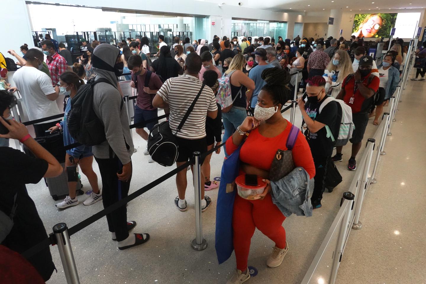 Flight delays abound as Labor Day weekend traffic picks up