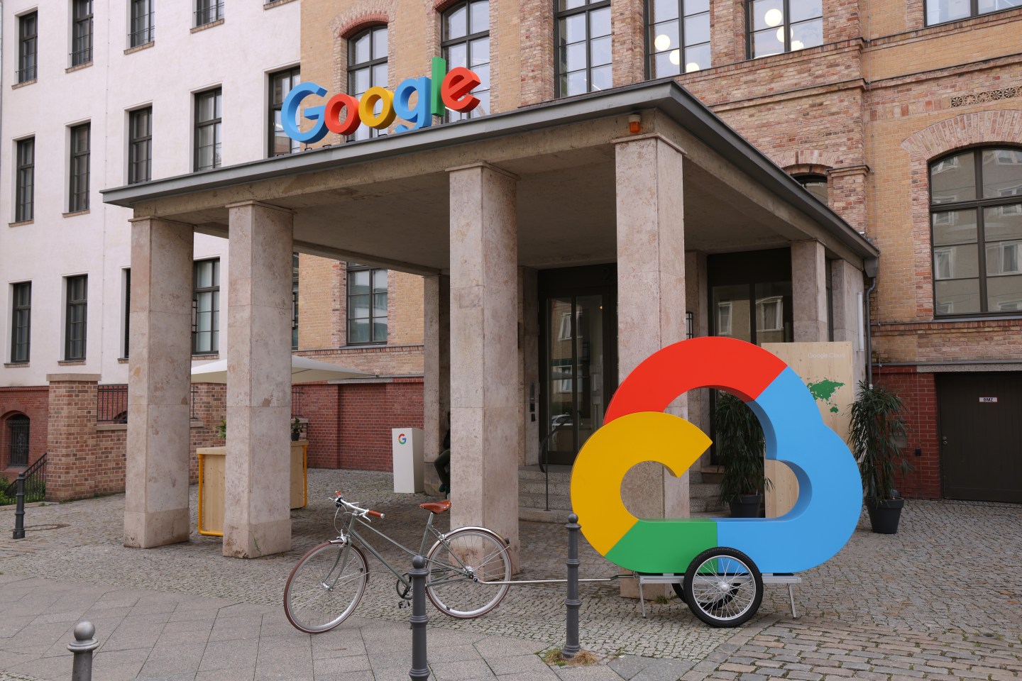 The Google corporate logo and Google Cloud logo stand outside the Google Germany offices on August 31, 2021 in Berlin, Germany.