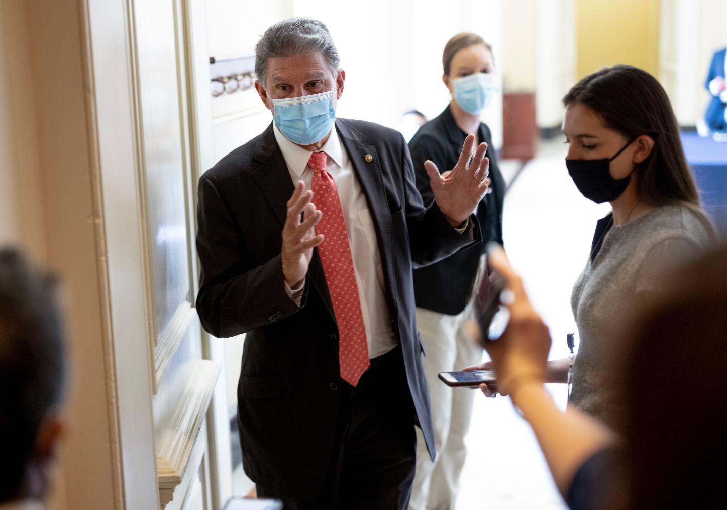 Democrat infighting risks delaying Biden’s ambitious tax and health care plans