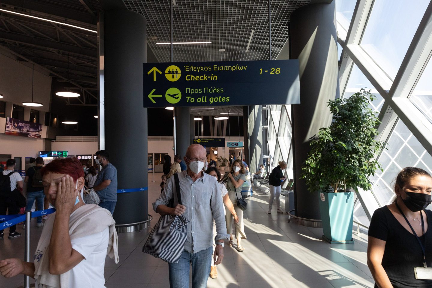 Photo of a crowded airport terminal in Thessaloniki, Greece.