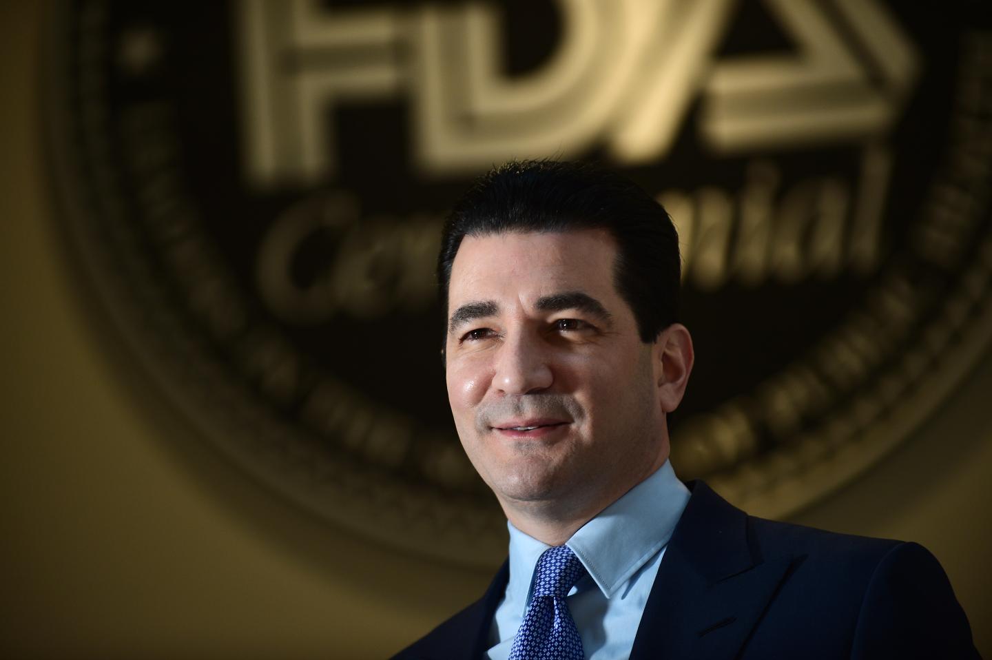 Scott Gottlieb, commissioner of the Food and Drug Administration (FDA), poses for portrait photographs in front of the old FDA sign at the FDA in White Oak, Md, November 5, 2018.