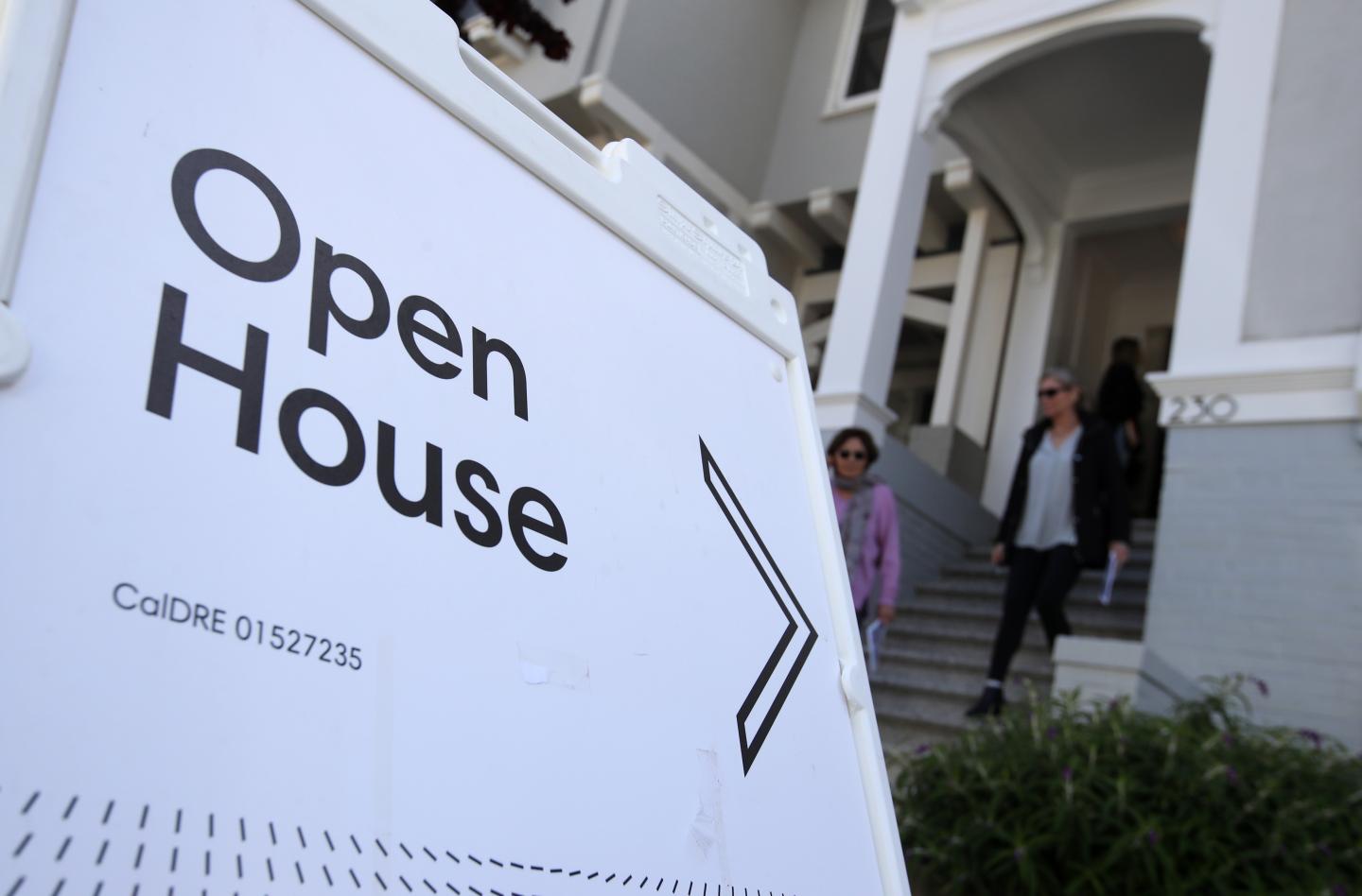 The housing market will cool off in 2022, but not by much, says Fannie Mae