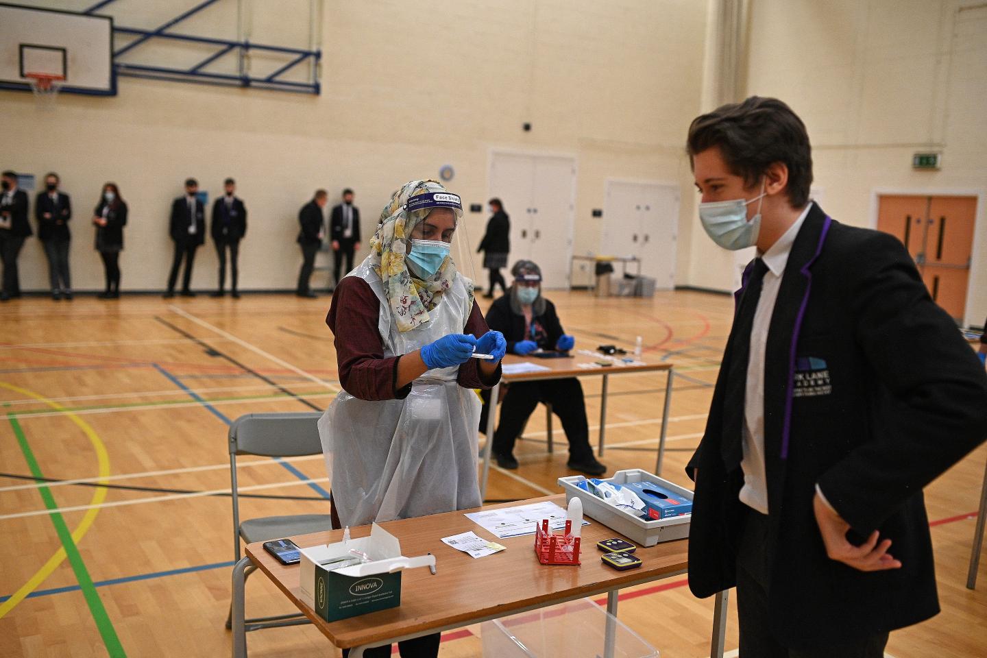 COVID-19 cases surge in schools as U.K. waits to offer vaccines to adolescents