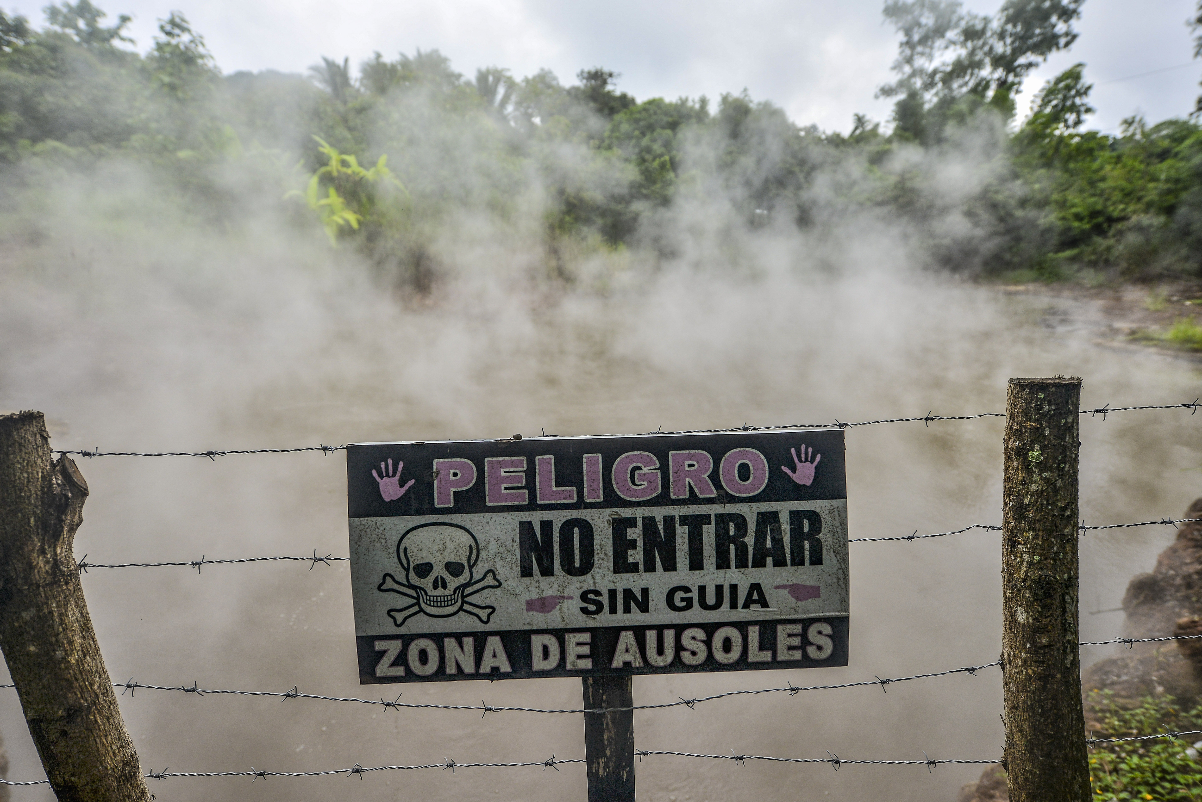A danger sign at a geyser where a volcano releases energy.
Salvadoran President Nayib Bukele has announced that the government will expand its geothermal energy infrastructure to begin bitcoin mining projects. 