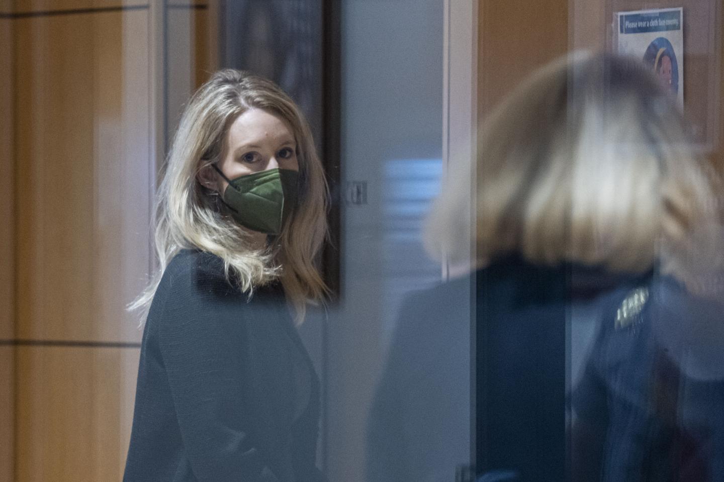 Theranos CEO Holmes faked pharma backing to lure Walgreens deal, U.S. says