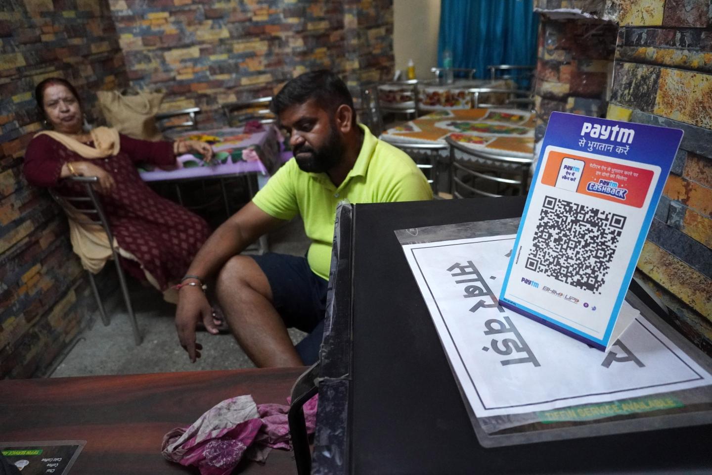 A Paytm QR code is seen outside a food stall in New Delhi, India on October 24, 2021.