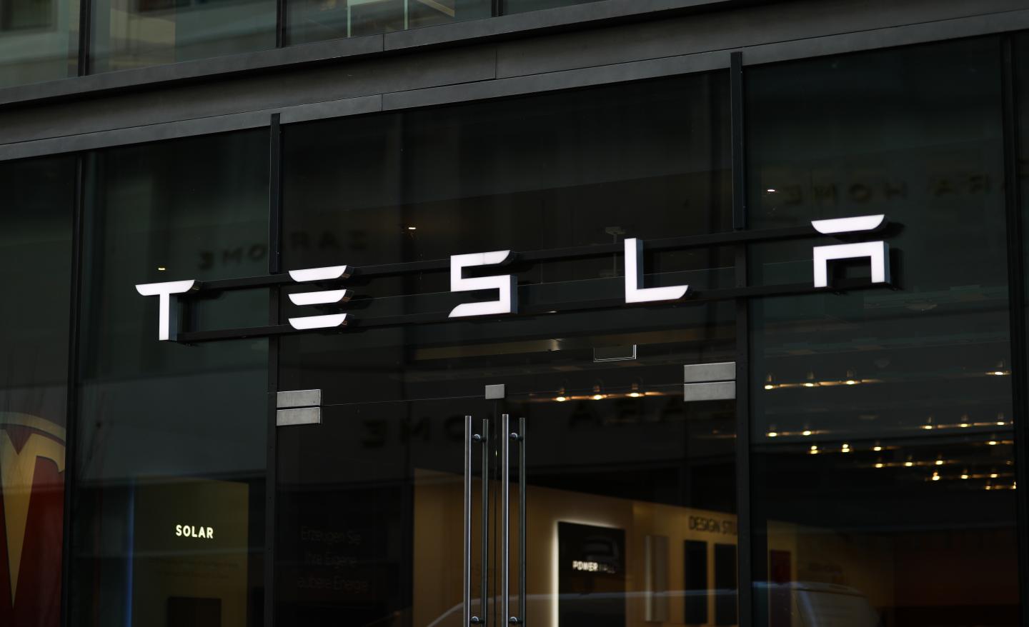 Tesla and Facebook advance in pre-market as the Nasdaq nears a new record