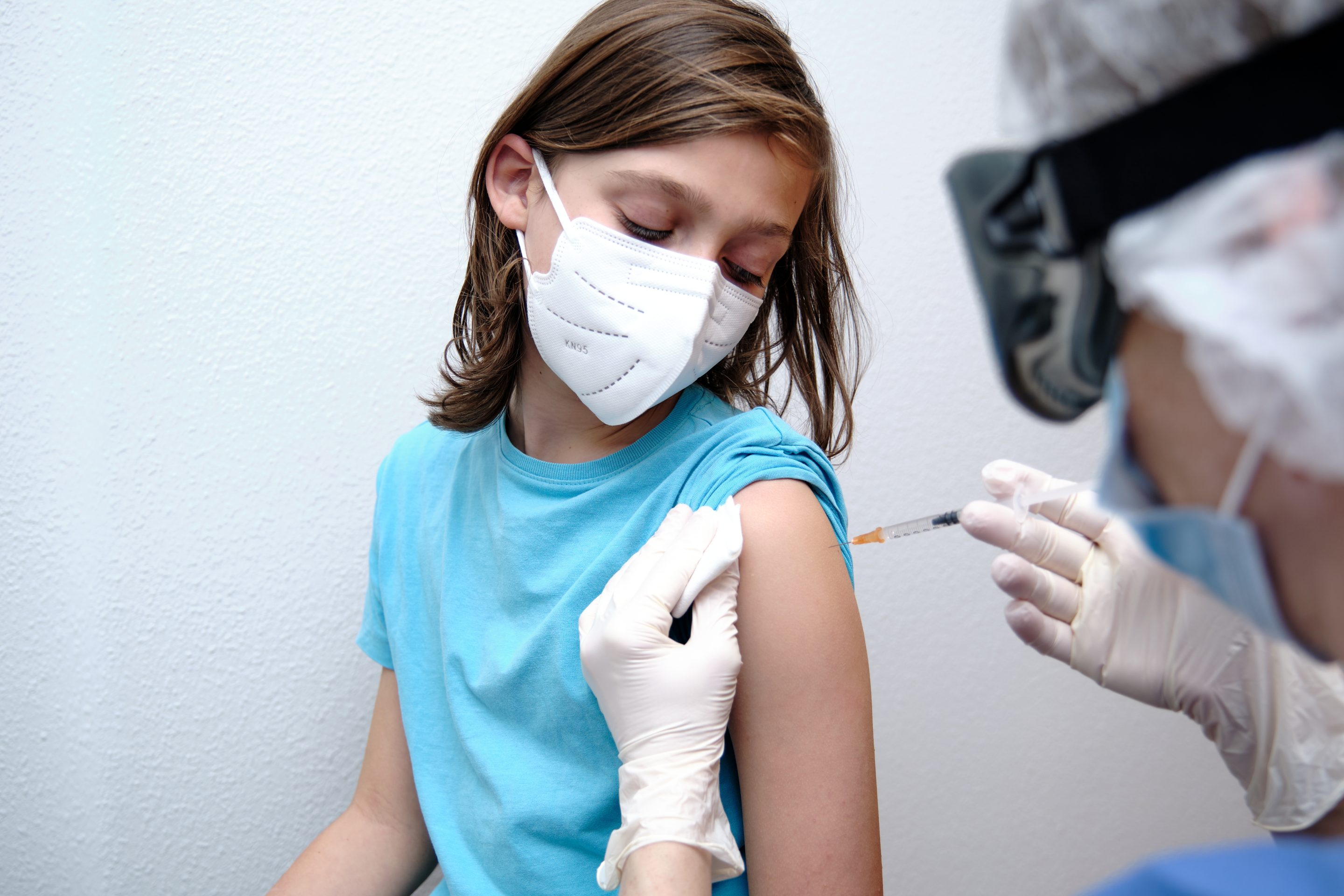 Boy getting vaccinated