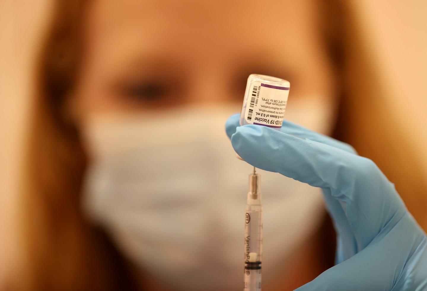 Medical worker with COVID-19 vaccine
