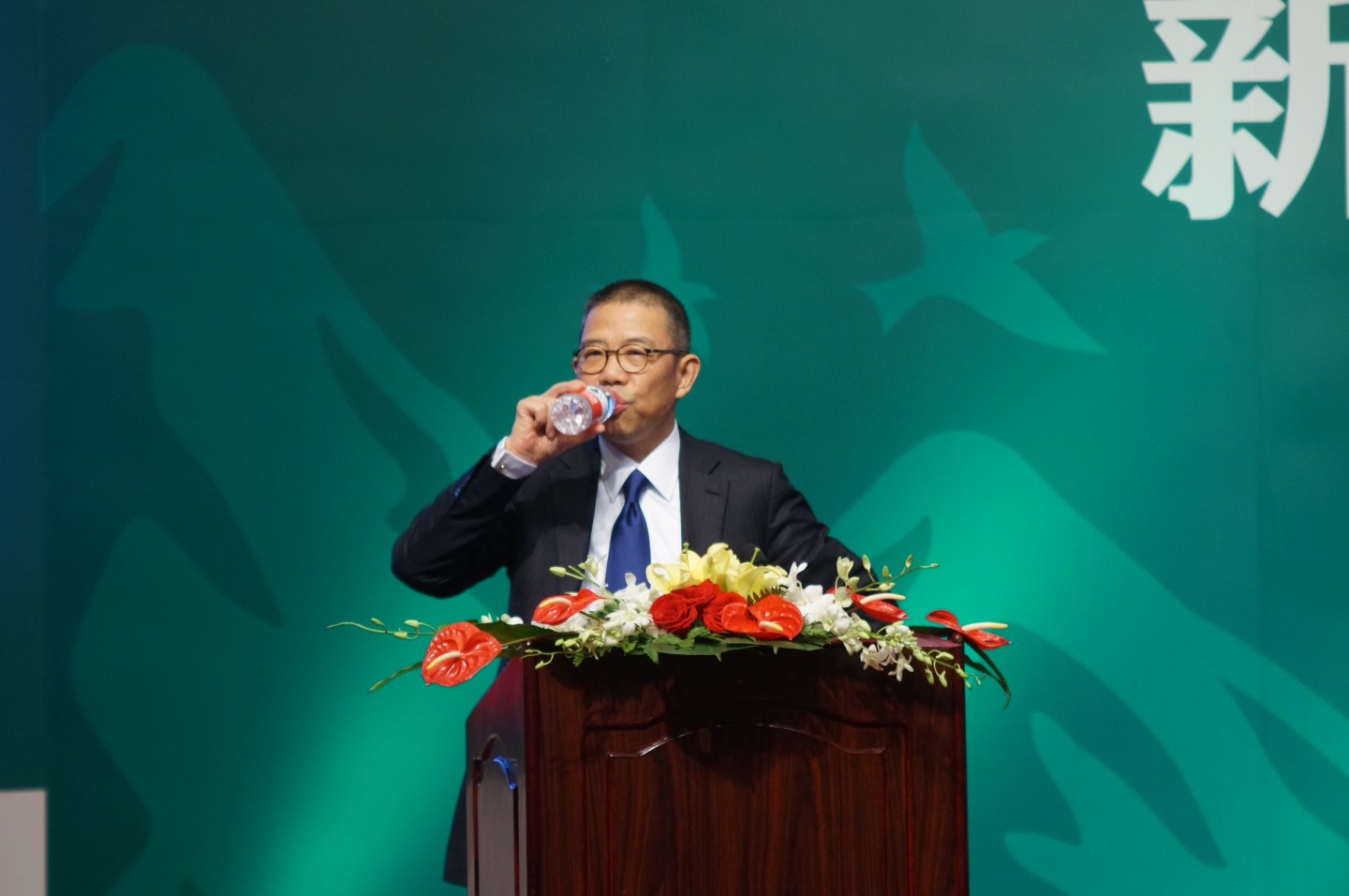 BEIJING, CHINA &#8211; MAY 06: Zhong Shanshan, founder and chairman of bottled water company Nongfu Spring, drinks Nongfu Spring bottled water at a Nongfu Spring press conference on May 6, 2013 in Beijing, China. (Photo by VCG/VCG via Getty Images)
