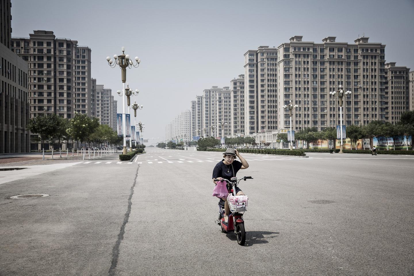 Evergrande and property speculation force Beijing to consider an idea that’s radical in China: Taxing real estate