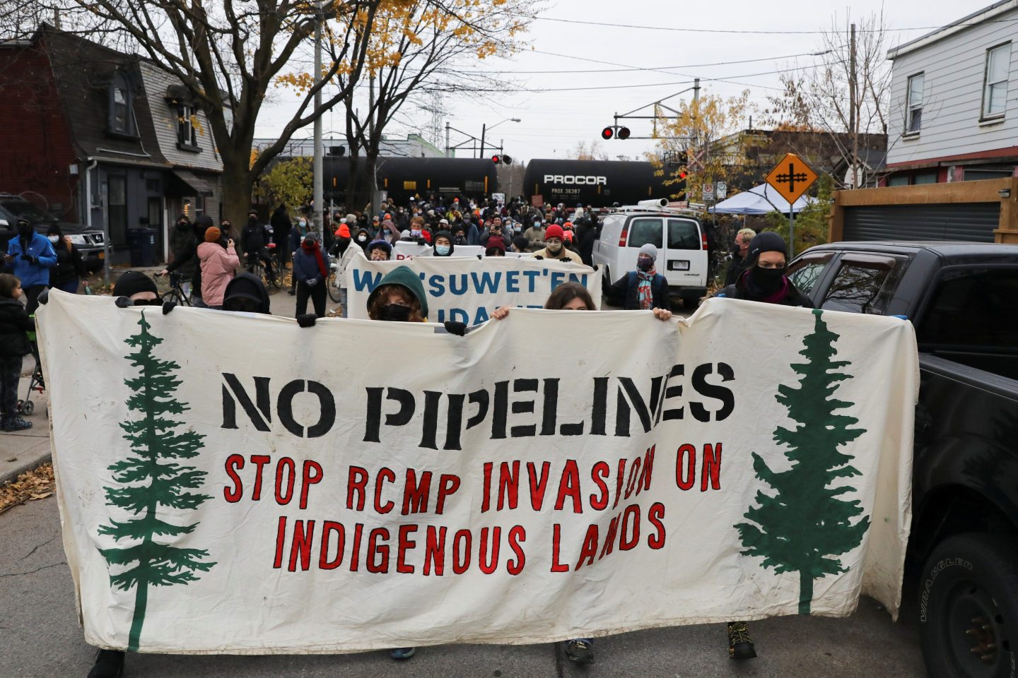 People march in support holding signs