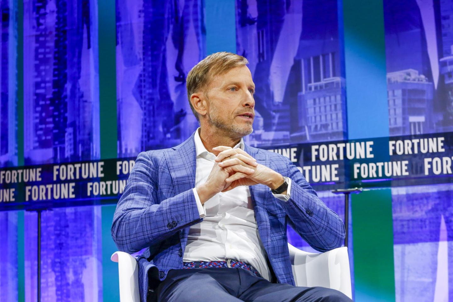 Dr. Mark Dybul on stage at Fortune's CEO Initiative conference