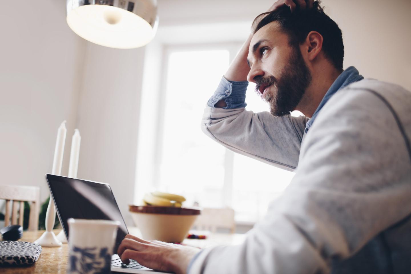 man at computer
