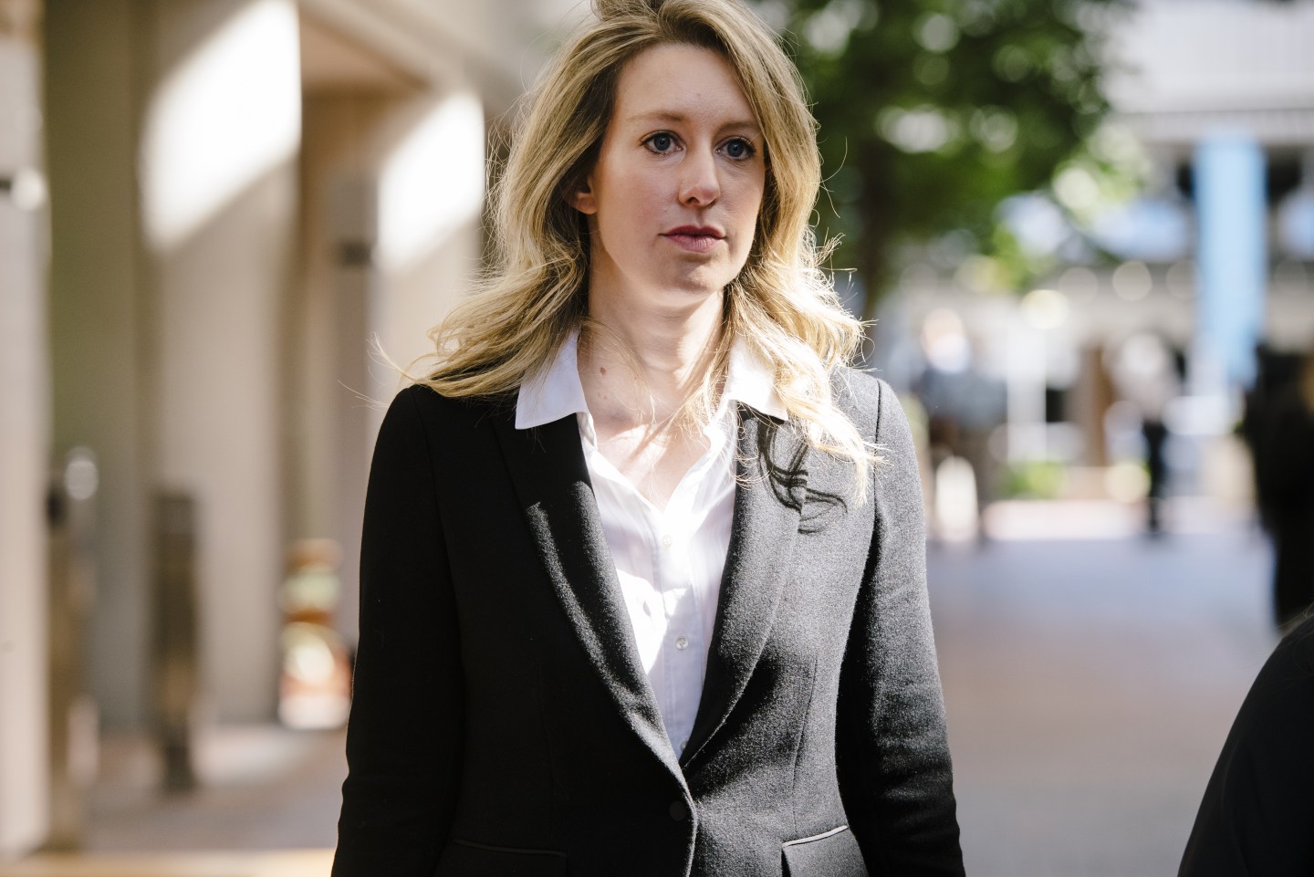 Elizabeth Holmes leaves court.