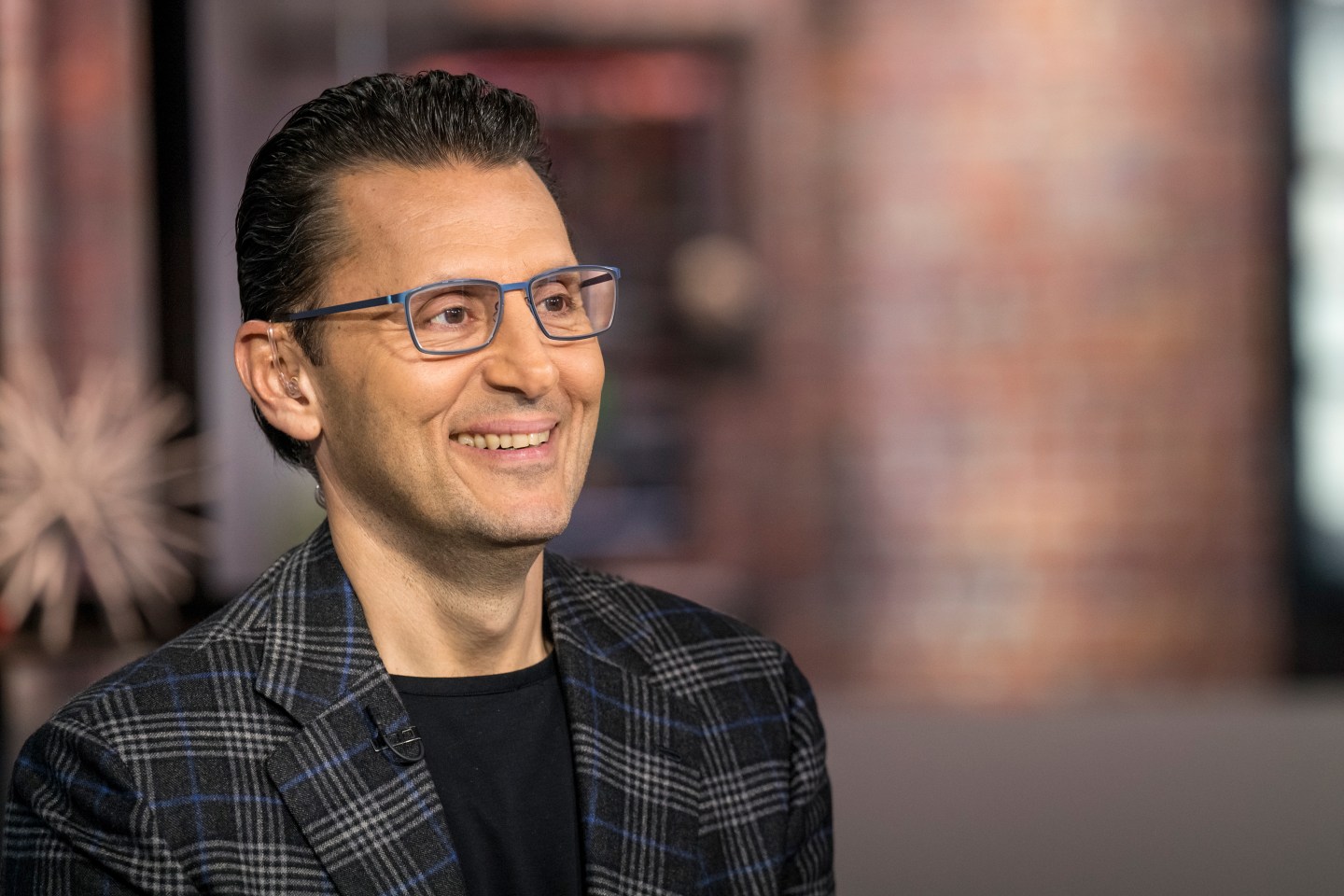 Sasan Goodarzi, president and chief executive officer of Intuit Inc., smiles during a Bloomberg Television interview in San Francisco, California, U.S., on Tuesday, Feb. 25, 2020.