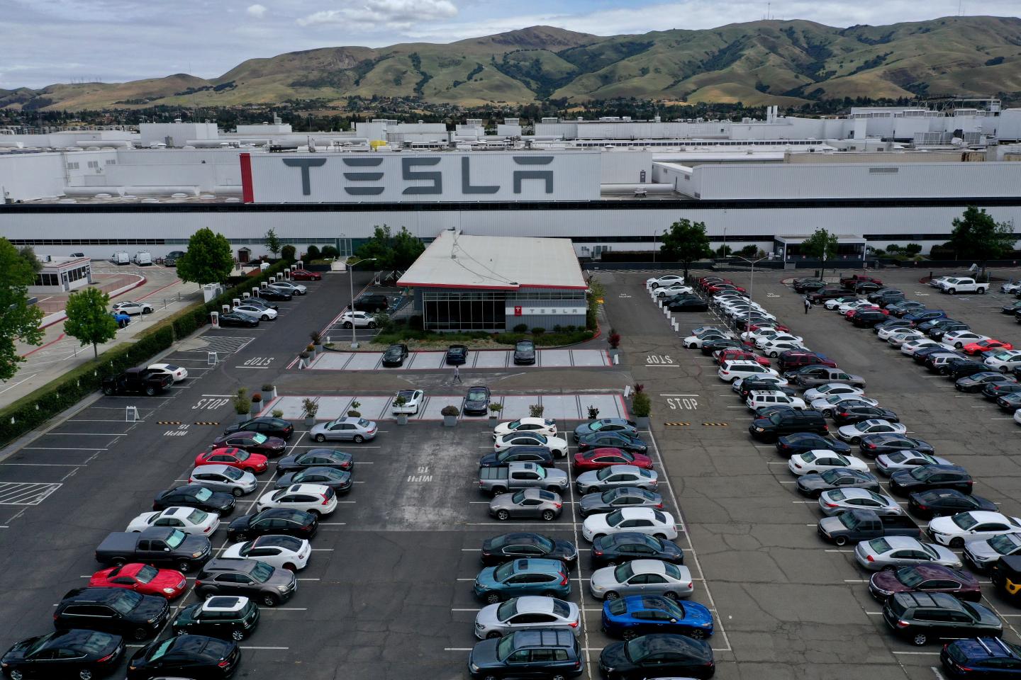 Tesla subjects women to ‘rampant’ harassment, suit says