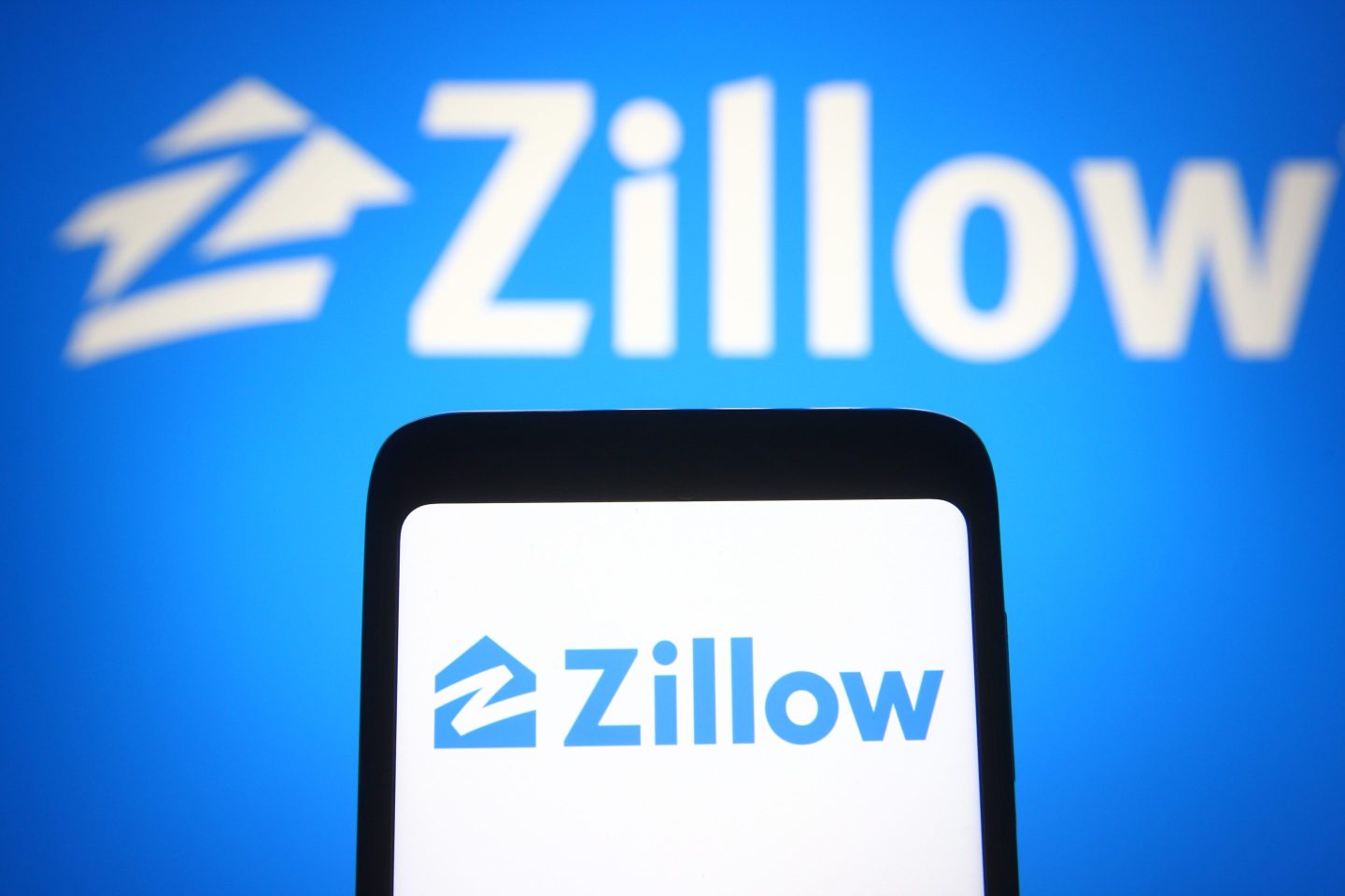 Zillow logo displayed on mobile phone