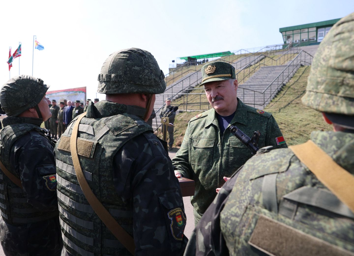 Belarus' President Alexander Lukashenko greets the troops during a military drill outside Brest, on September 12, 2021.