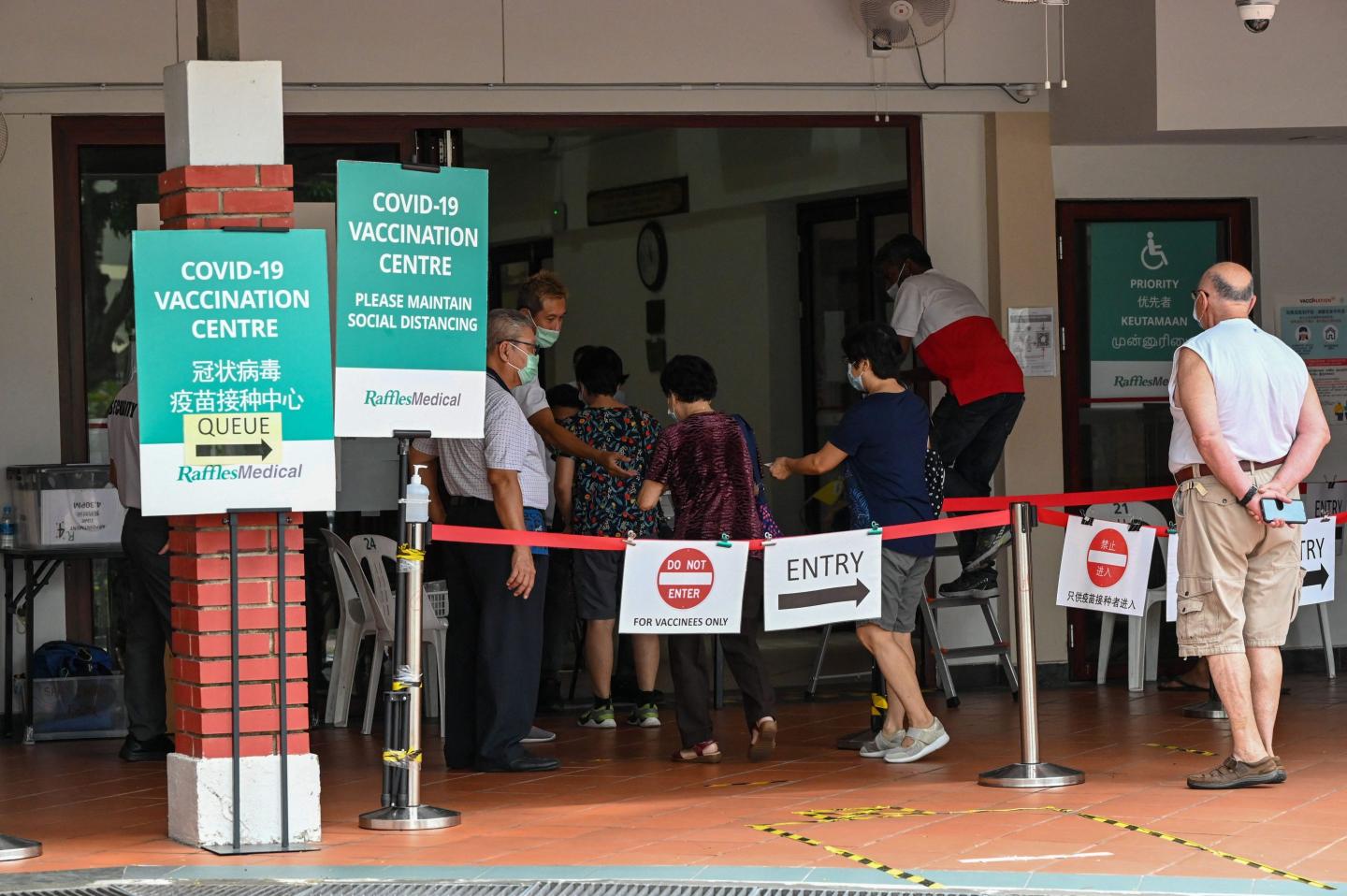 Singapore withdraws free health care for COVID patients who are ‘unvaccinated by choice’