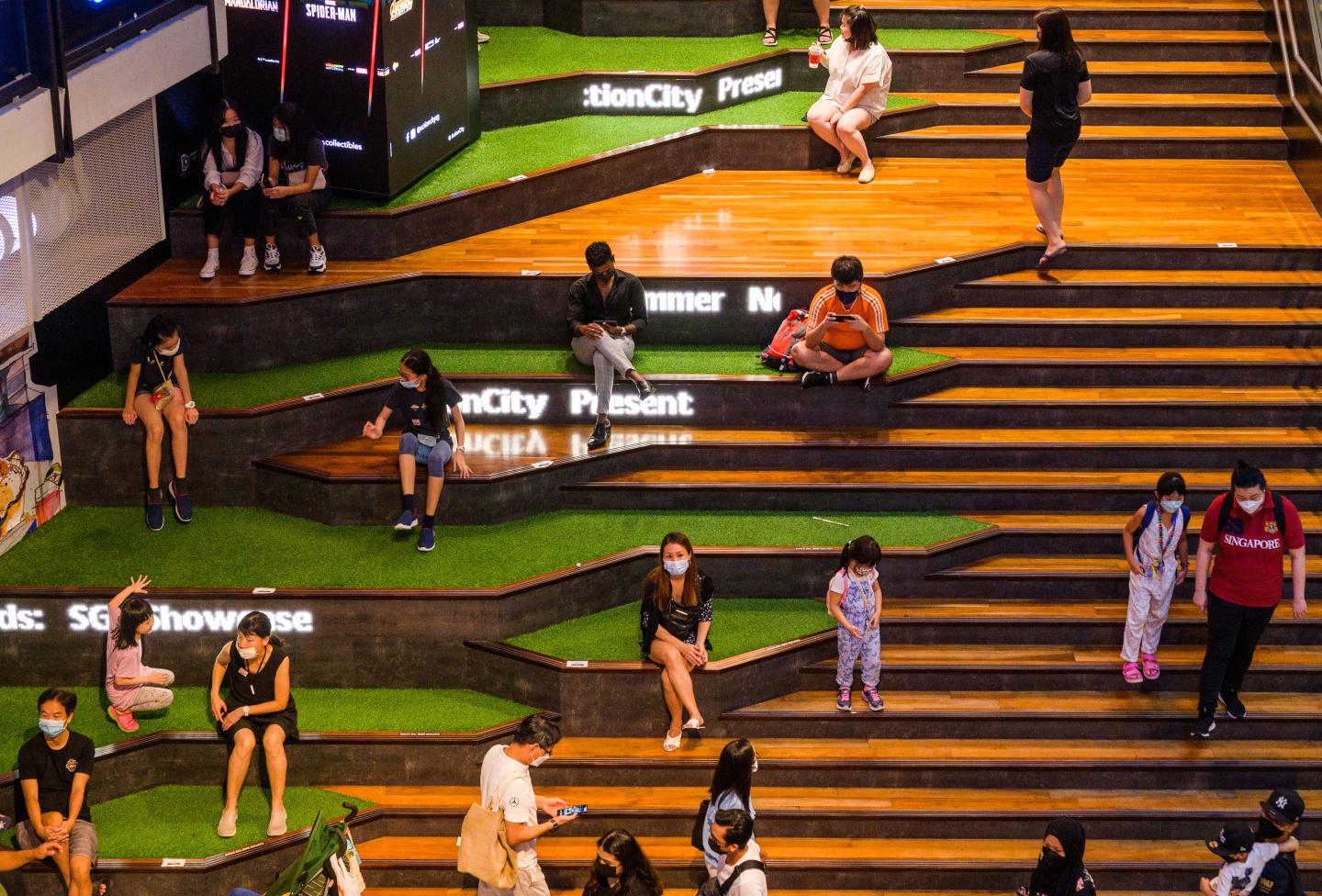 Bloomberg conference attendees are getting special treatment in Singapore—and it’s reigniting a debate over foreign workers
