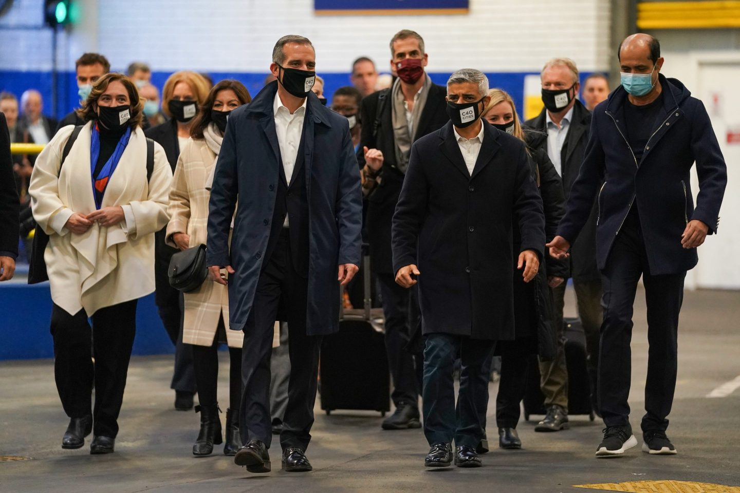 London Mayor Sadiq Khan (center, right) with a group of mayors at Euston Station, London, on Nov. 1, 2021, before boarding a “mayors’ train” to the COP26 summit in Glasgow. “Count on cities to launch the seeds of the kind of green revolution we really need,” writes Gregor Robertson.