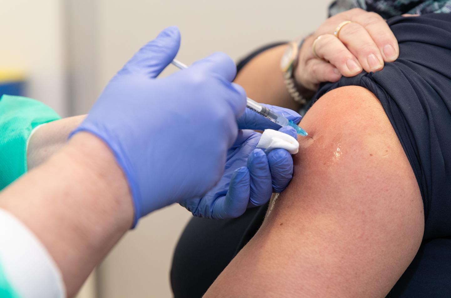 Here are the side effects you can expect from a COVID-19 vaccine booster shot