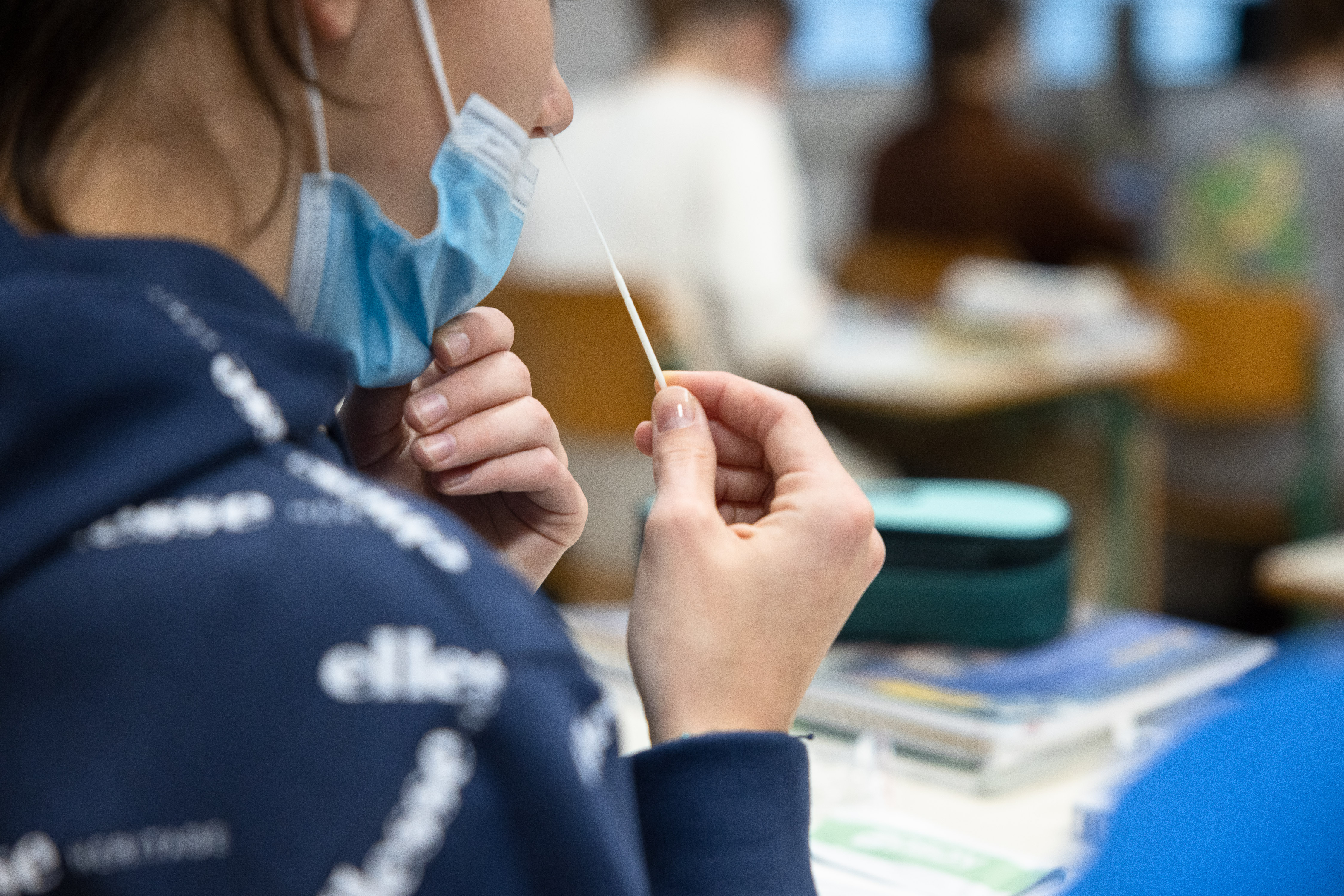 A student self-tests with a rapid COVID-19 antigen self-test kit in a primary school in Kranj, Slovenia. Starting on Nov. 17, primary and secondary school children in Slovenia are required to self-test in school three times a week as the country faces a severe outbreak of COVID-19.