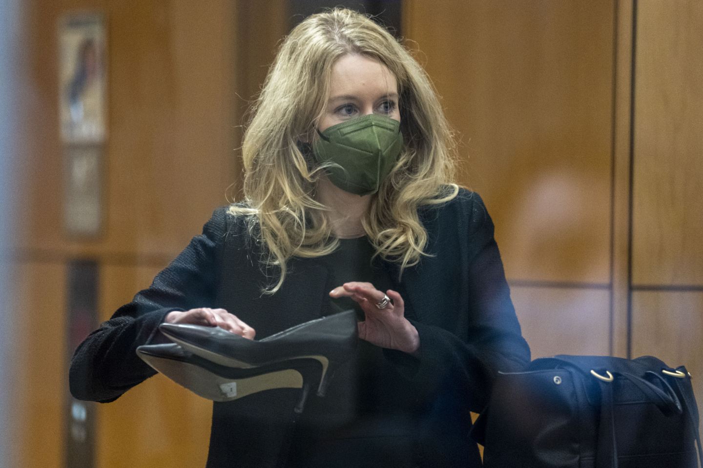 Theranos founder testifies her deception was for legitimate business reasons