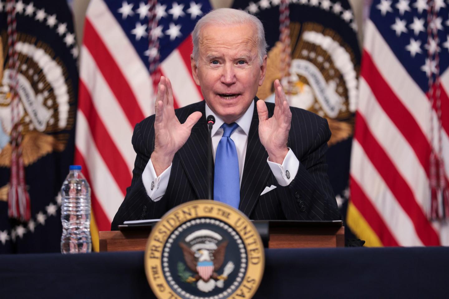 Biden says Omicron demands that countries share vaccines as China donates 1 billion doses to Africa